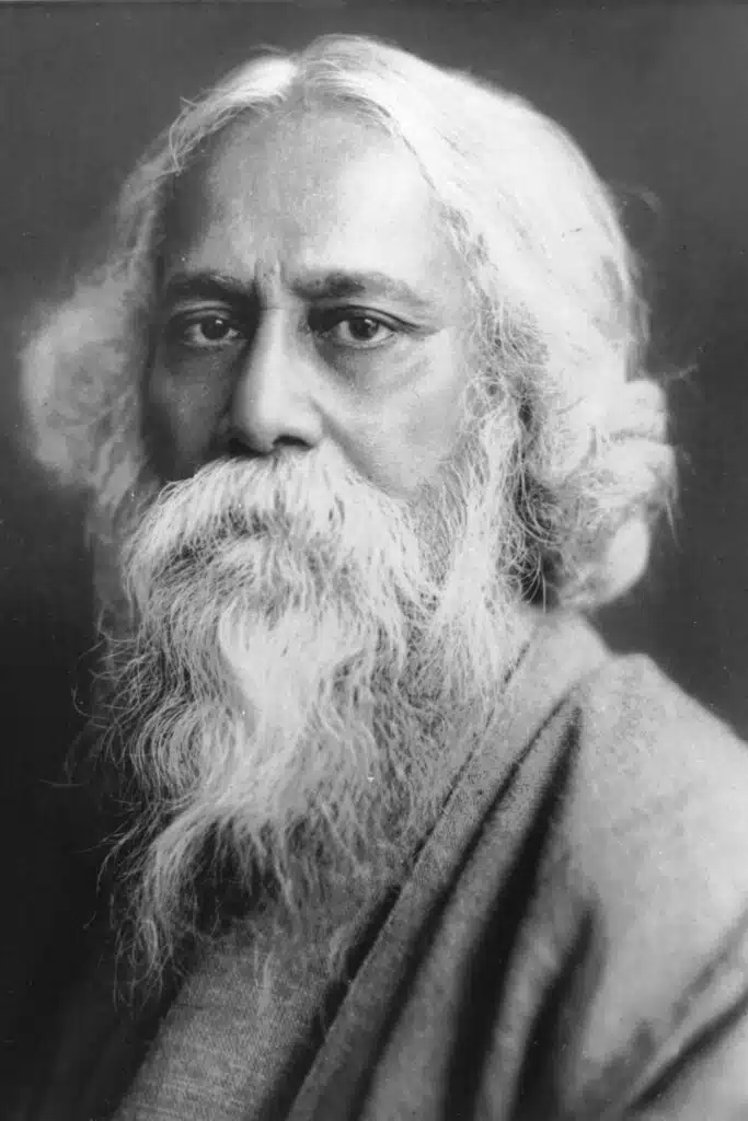 Rabindranath tagore as an older man staring in to the camera