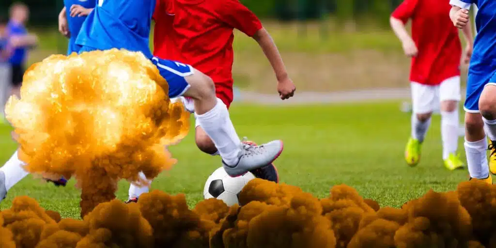 people playing football overlaid with an explosion